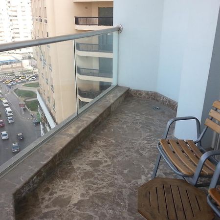 Hilton Alexandria Corniche Hotel Extérieur photo A balcony in a residential building in Cairo, Egypt