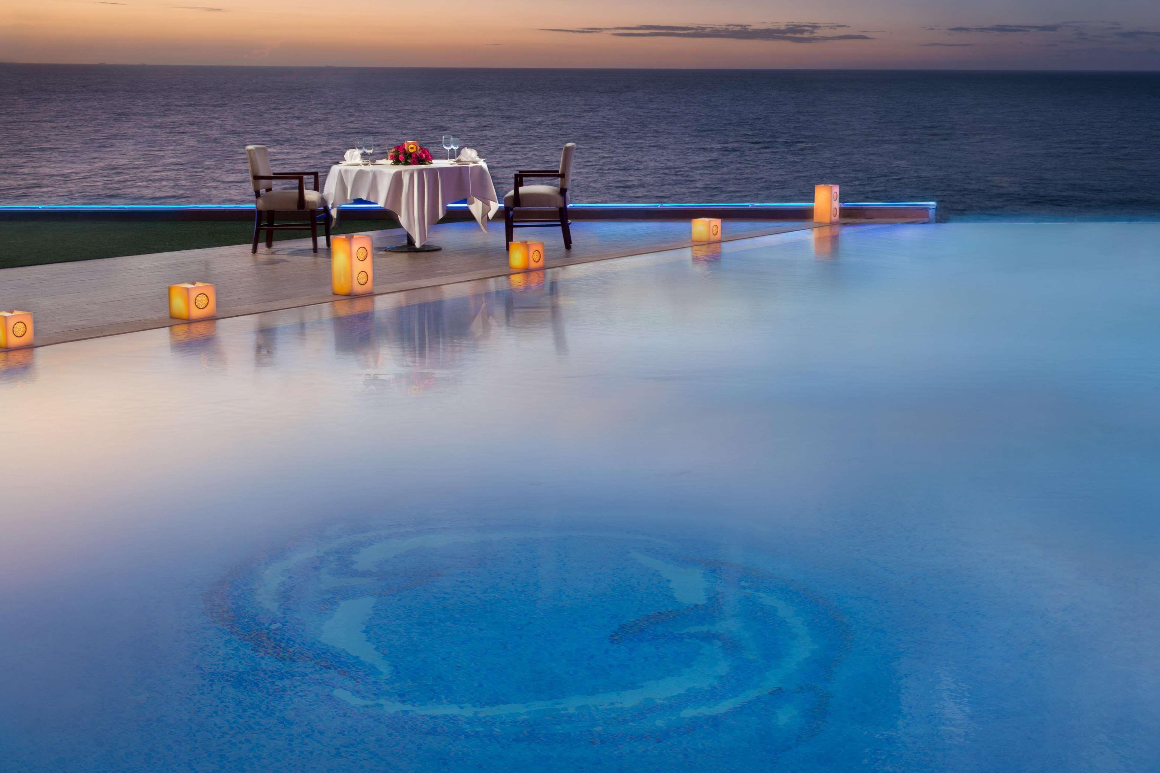 Hilton Alexandria Corniche Hotel Extérieur photo Infinity pool at the Four Seasons Resort, Maldives