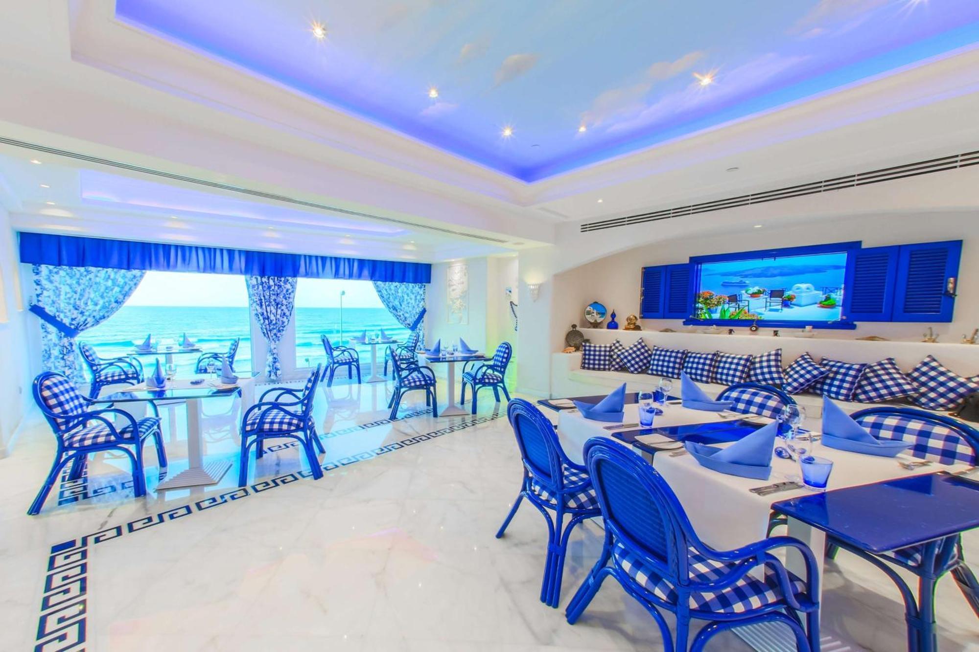 Hilton Alexandria Corniche Hotel Extérieur photo The Blue Lagoon restaurant